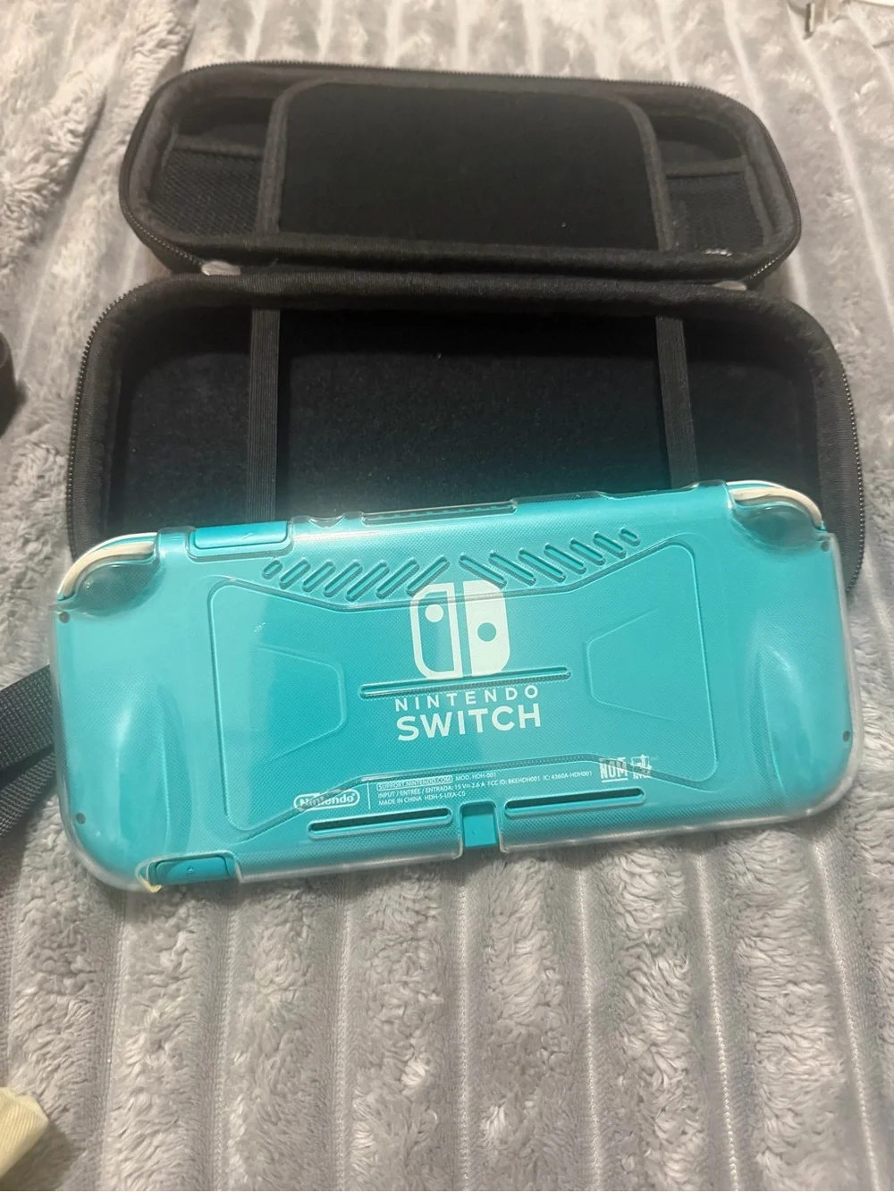 Nintendo Switch Lite Turquoise Handheld Console with Screen On